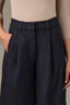 Dark Indigo Contour Shape Technology Skyrise Relaxed Barrel Leg Pleated Button Hem Trouser